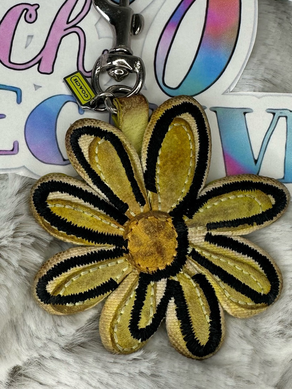 Coach yellow flower charm